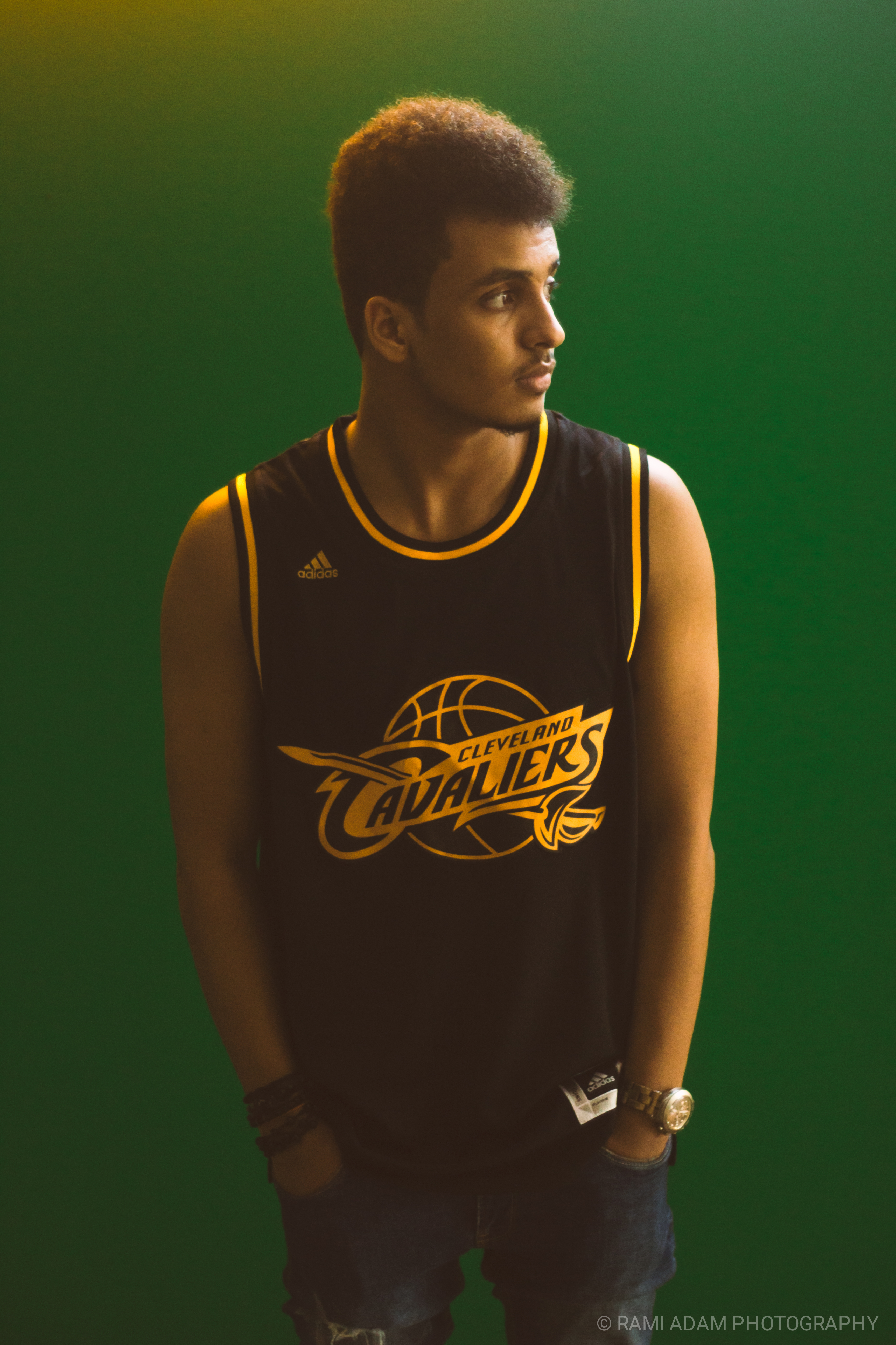 Studio portrait with green background