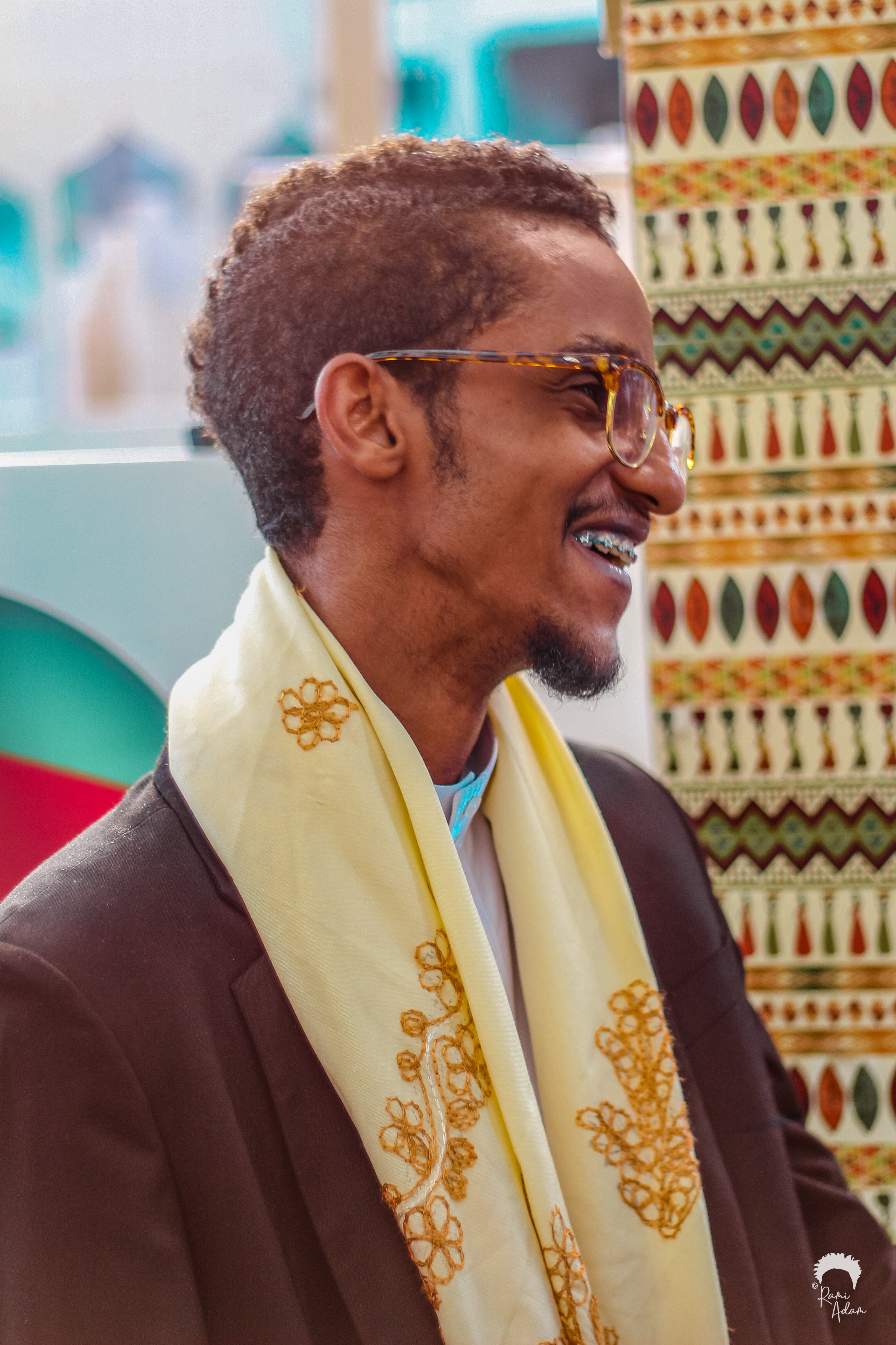 Profile portrait with embroidered scarf